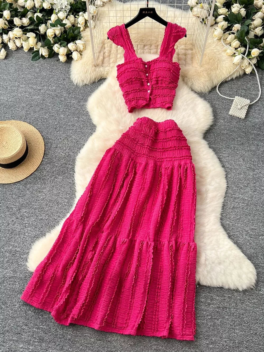 Rose Red textured two-piece set with ruffled details, buttoned crop top and tiered maxi skirt