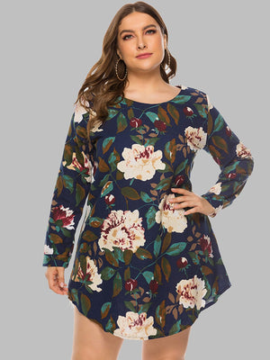 Navy botanical print trapeze mini dress with long sleeves and a round neckline.