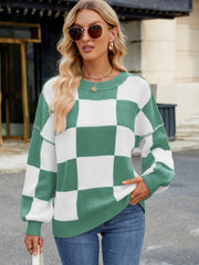 Checkerboard knit sweater in Gum Leaf green and white with balloon sleeves and crew neck.
