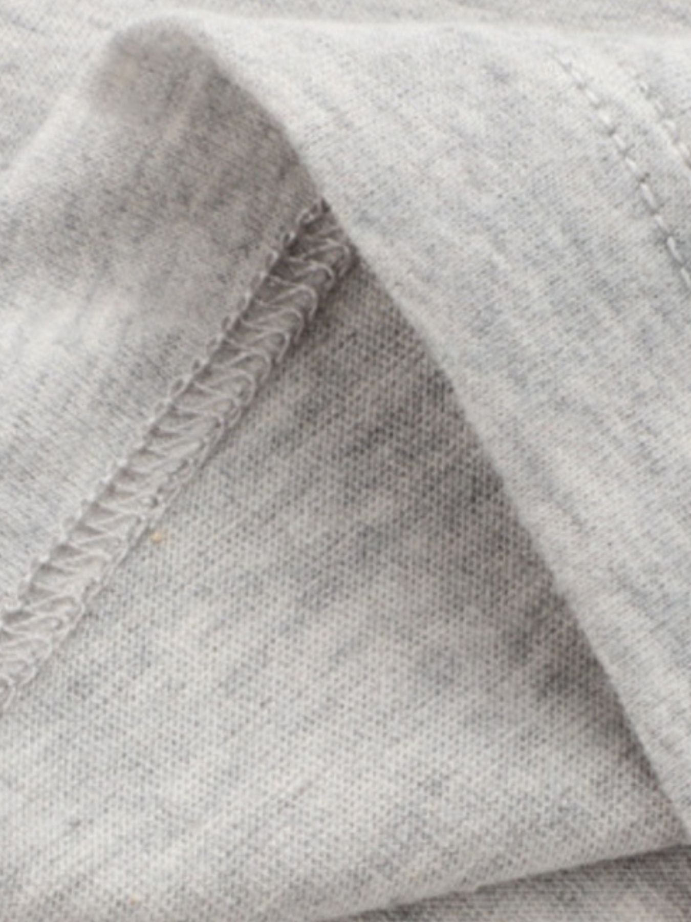 Heather grey cotton toddler t-shirt detail showing seams and fabric texture.