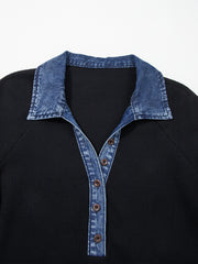 Black textured knit polo top with denim collar and button placket.