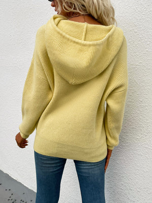 Yellow textured knit cocoon hoodie with a relaxed fit and hood.