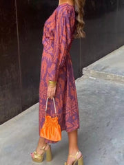 Printed V-neck Long Sleeve Twisted Midi Dress Plus Size in Dark Green, model styling view