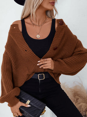 Brown button-up cardigan with distressed details and a relaxed fit.