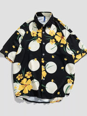 Black oversized button-up shirt with yellow floral and white circle print