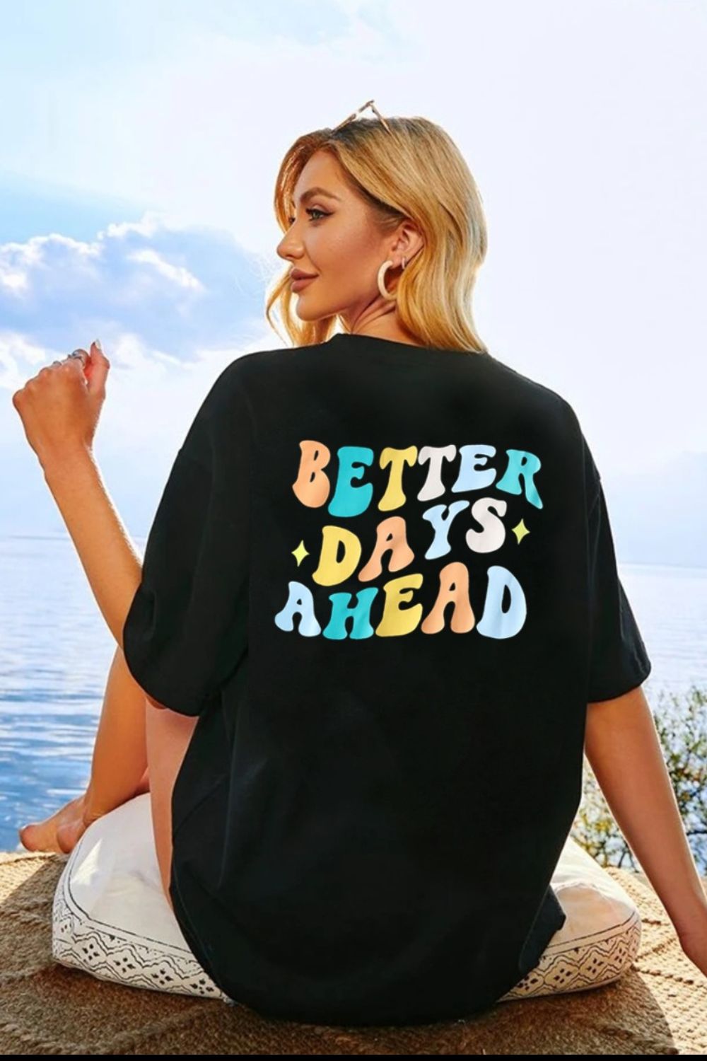 Black oversized graphic tee with retro "Better Days Ahead" text in colorful wavy font