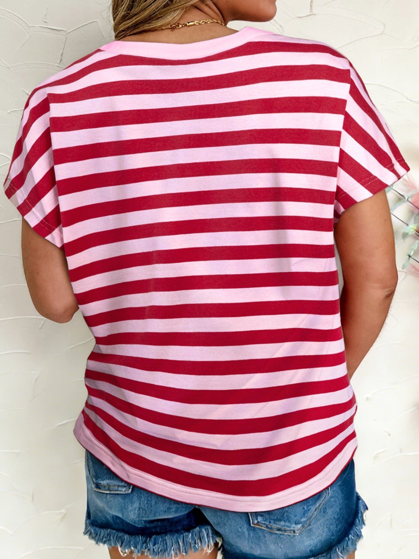 Stripe split v neck t-shirt in red and pink cotton blend with short sleeves.