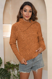 Caramel textured knit sweater with asymmetric collar and long sleeves.
