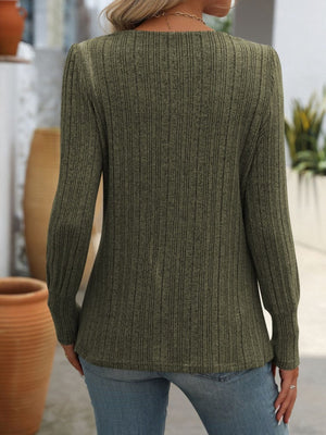 Army green ribbed knit top with side button detail, long sleeves.