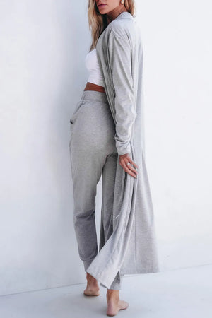 Gray duster cardigan and jogger set with pockets, styled with a white crop top.