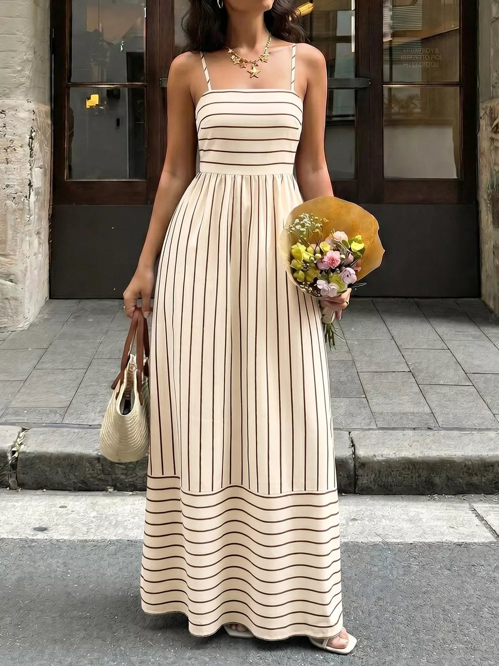 Apricot striped maxi dress with square neckline and smocked detail.
