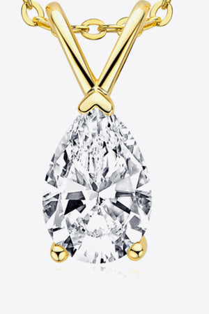 Gold pear cut moissanite pendant necklace with delicate chain and V-shaped bail.