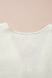 Cream textured knit tank top with a rounded neckline and ribbed detail.