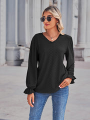 Black lace trim eyelet blouse with v-neck and ruffle cuffs