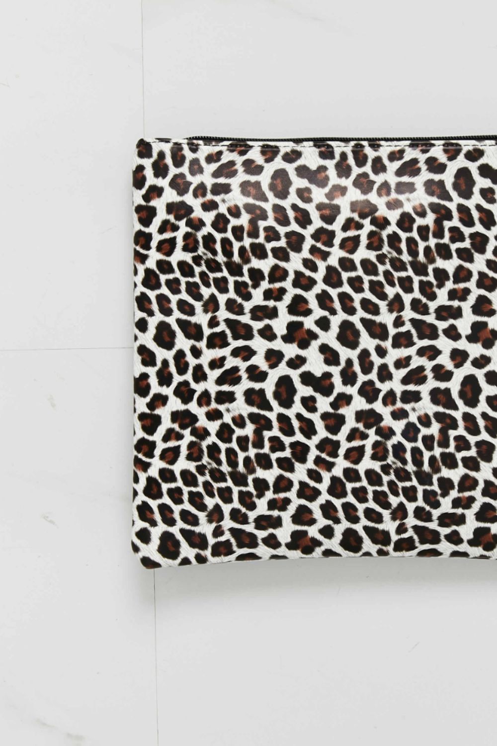 Leopard print wristlet pouch with zipper closure