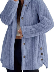 Blue button-up fleece jacket with textured fabric and brown buttons.