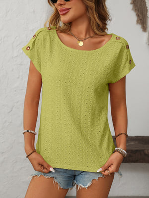 Yellow-green eyelet knit tee with shoulder button details and short sleeves.