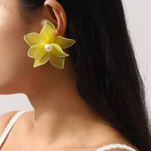 Yellow floral pearl stud earrings made of alloy with sheer petals.