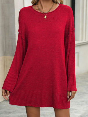 Scarlet oversized ribbed knit tunic sweater with crew neck and long sleeves.