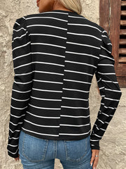 Black and white striped long sleeve top with gathered puff sleeves.
