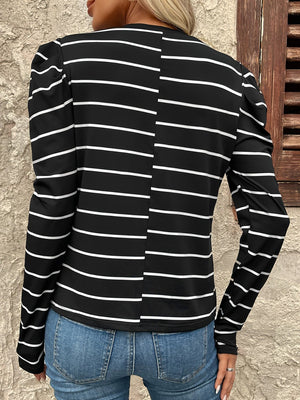 Black and white striped long sleeve top with gathered puff sleeves.