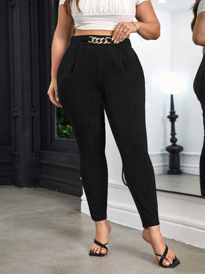 Chic black maternity pants with high waist and gold chain detail.