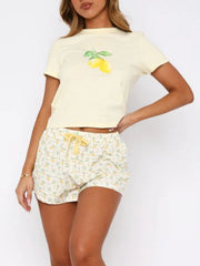 Bow tee and striped lounge shorts set in deep red, scarlet, white, blush pink, or pastel yellow.
