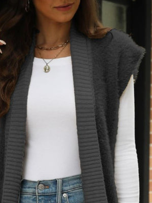 Sleeveless knit cardigan vest in dark gray with textured fuzzy sleeves and ribbed trim.