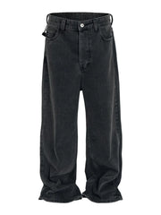 Baggy dark wash denim jeans with a sculpted hemline and relaxed fit.