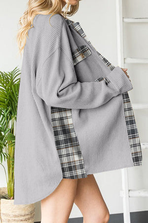 Light Gray waffle knit overshirt with plaid trim and button pocket detail.