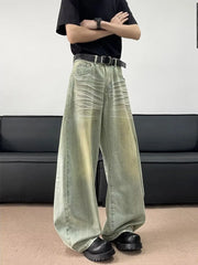 Men's oversized light blue cotton jeans with creasing detail and a relaxed fit.