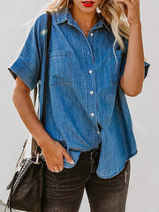 Denim button-front shirt in dark blue with short sleeves and two chest pockets.