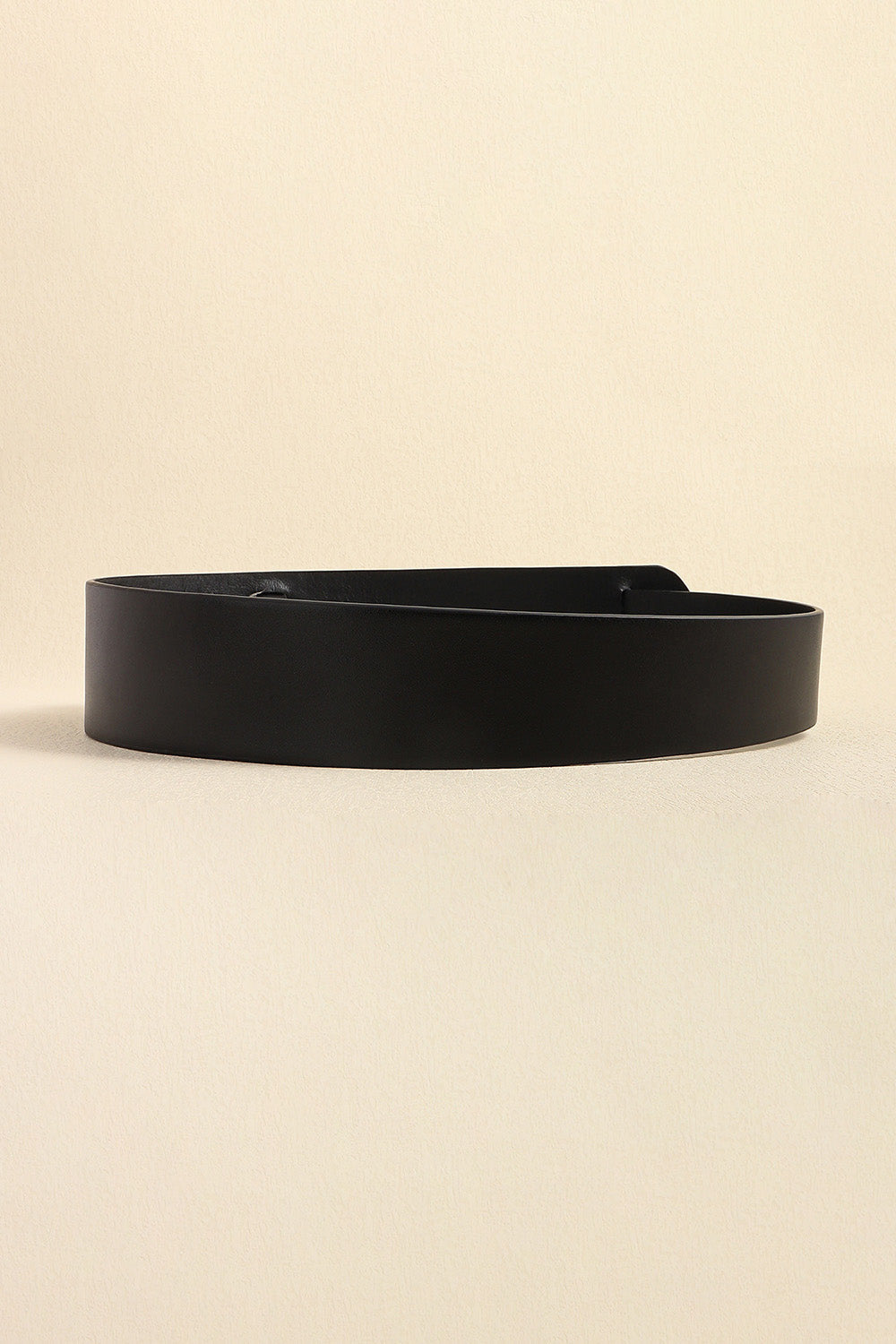 Black sculpted leather waist belt with adjustable buckle detail