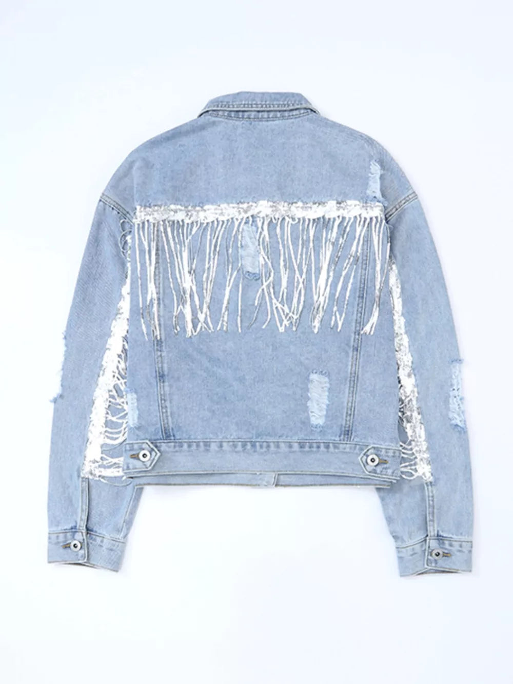 Light wash denim jacket with sequined fringe and distressed details.