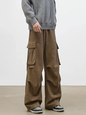 Brown utility cargo pants with multiple pockets and a relaxed fit.