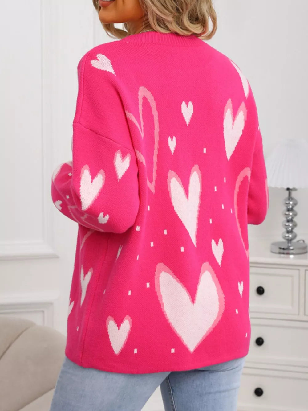 Heartfelt Fuchsia Knit Sweater with allover white hearts, crew neck, acrylic.