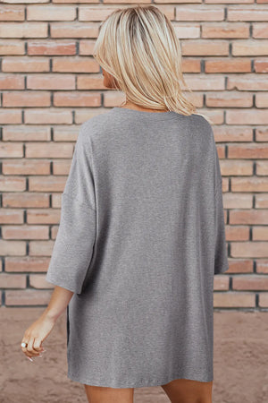 Gray ribbed knit lounge set top with relaxed silhouette and 3/4 sleeves.