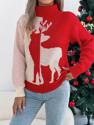 Red and cream split color knit turtleneck sweater with a white reindeer graphic.