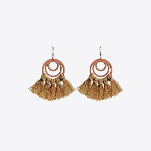 Macrame tassel and wood circle earrings in caramel with bohemian style.
