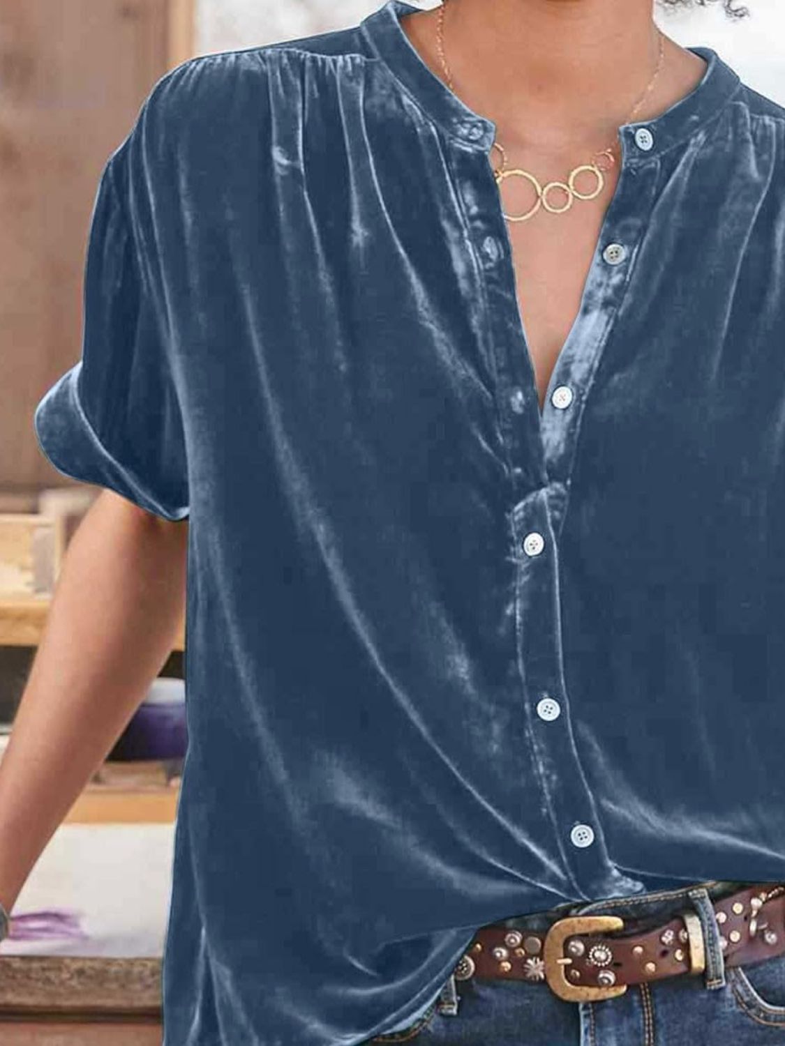 Dusty blue velvet button-down blouse with mandarin collar and short sleeves.