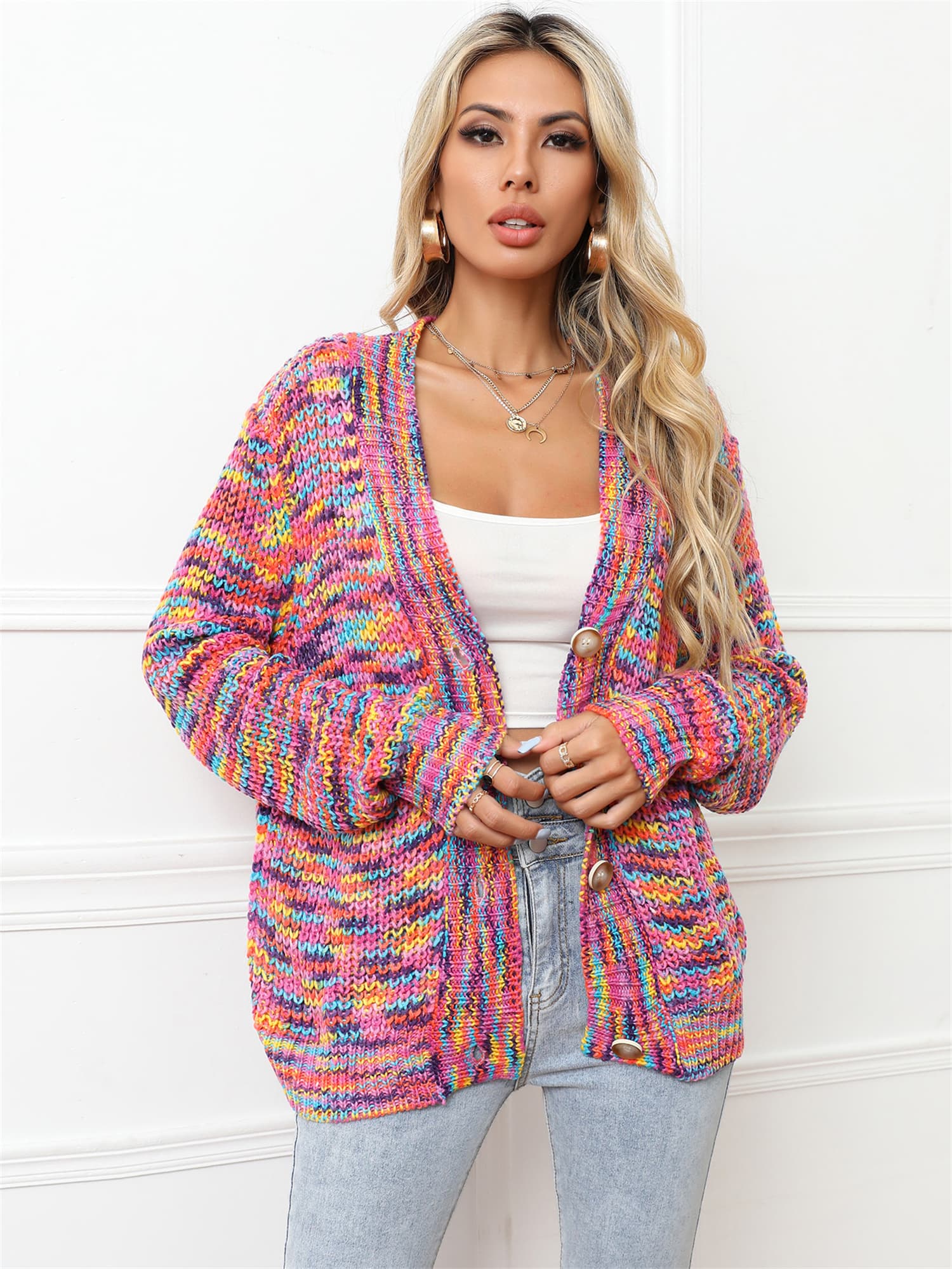 Multicolor knit button-down cardigan with a relaxed fit and button closure.