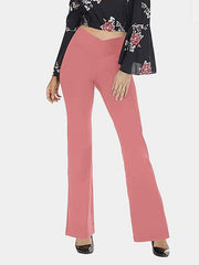V-waist flare leggings in Burnt Coral, with a v-shaped waistband and flared leg opening.