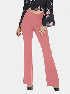 V-waist flare leggings in Burnt Coral, with a v-shaped waistband and flared leg opening.