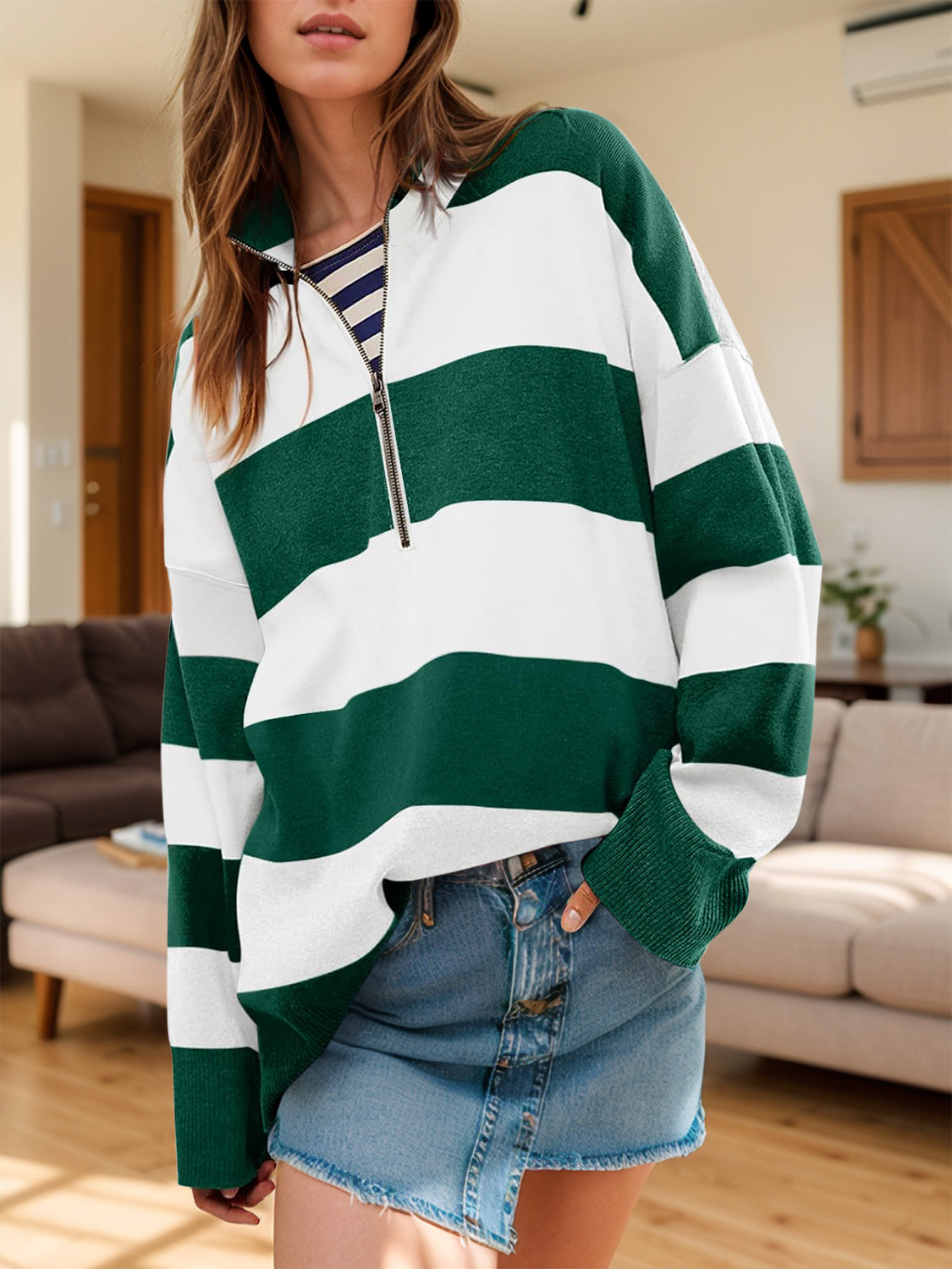 Oversized rugby stripe zip-up pullover in dark green and white acrylic knit with a contrast striped underlayer.