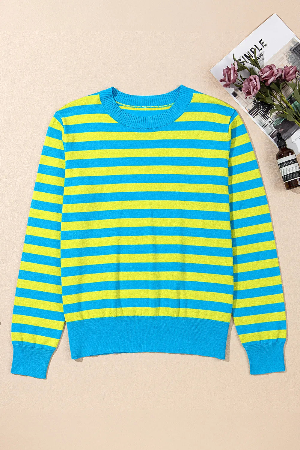 Electric Stripe Crewneck Sweater in Sky Blue with yellow stripes, crew neck, long sleeves.