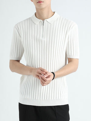 White ribbed knit polo shirt with zip neck and short sleeves.