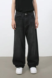 Black wide leg denim jeans with a casual, relaxed fit.