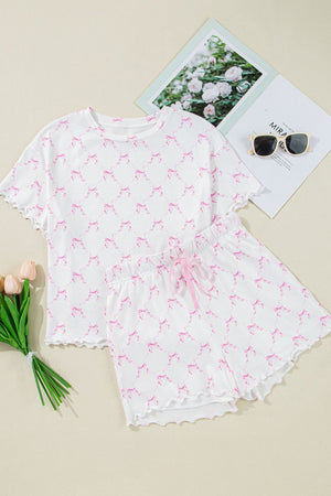 Pink bow print loungewear set with scalloped edges and a drawstring waist.