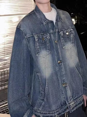 Blue washed denim trucker jacket with button front and chest pockets.