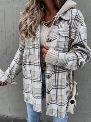 Oversized plaid shacket in camel with button details and a hood.